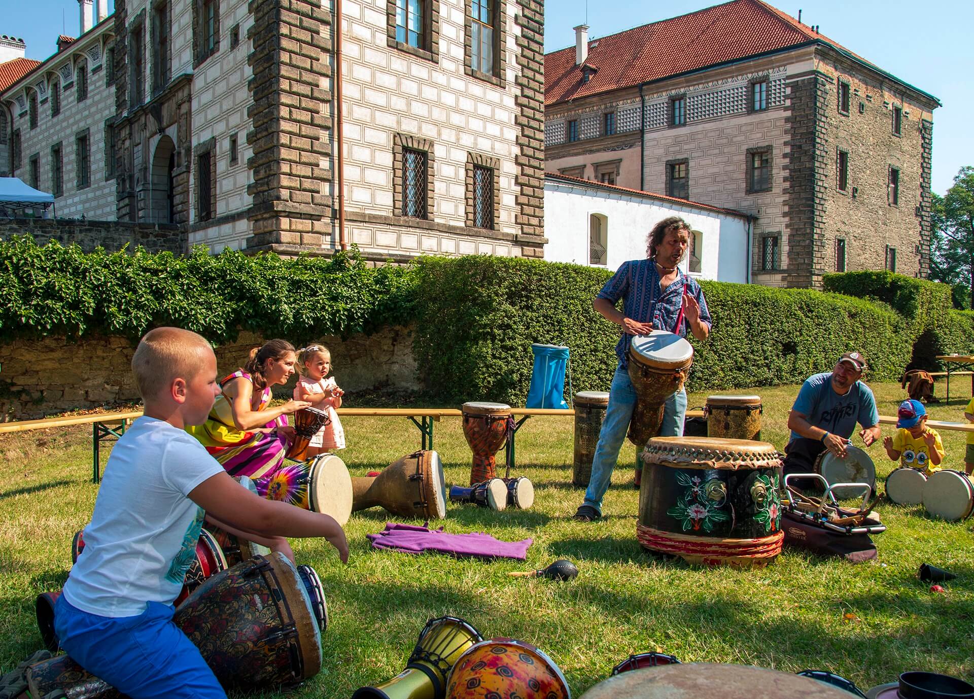 playing drums in the park of nelahozeves castle